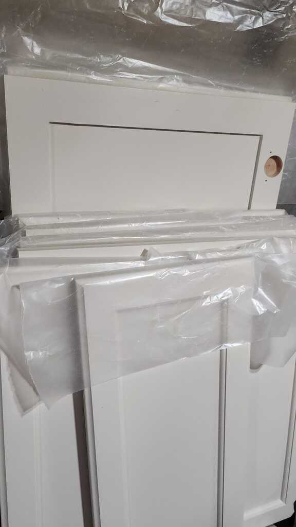 Cabinet wrapped in plastic
